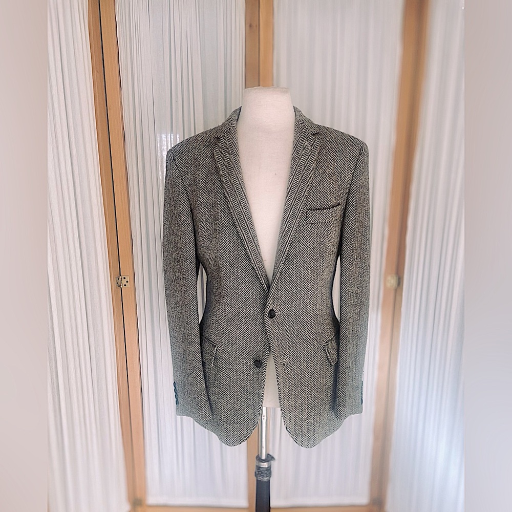 Herringbone tweed blazer.